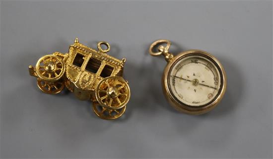 A late Victorian 15ct gold and carnelian set compass fob and a later 9ct gold carriage charm.